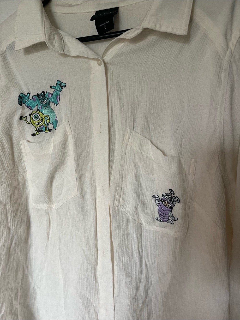 Cream Button-Up Shirt with Monster’s Inc Patches - Picture 2 of 6